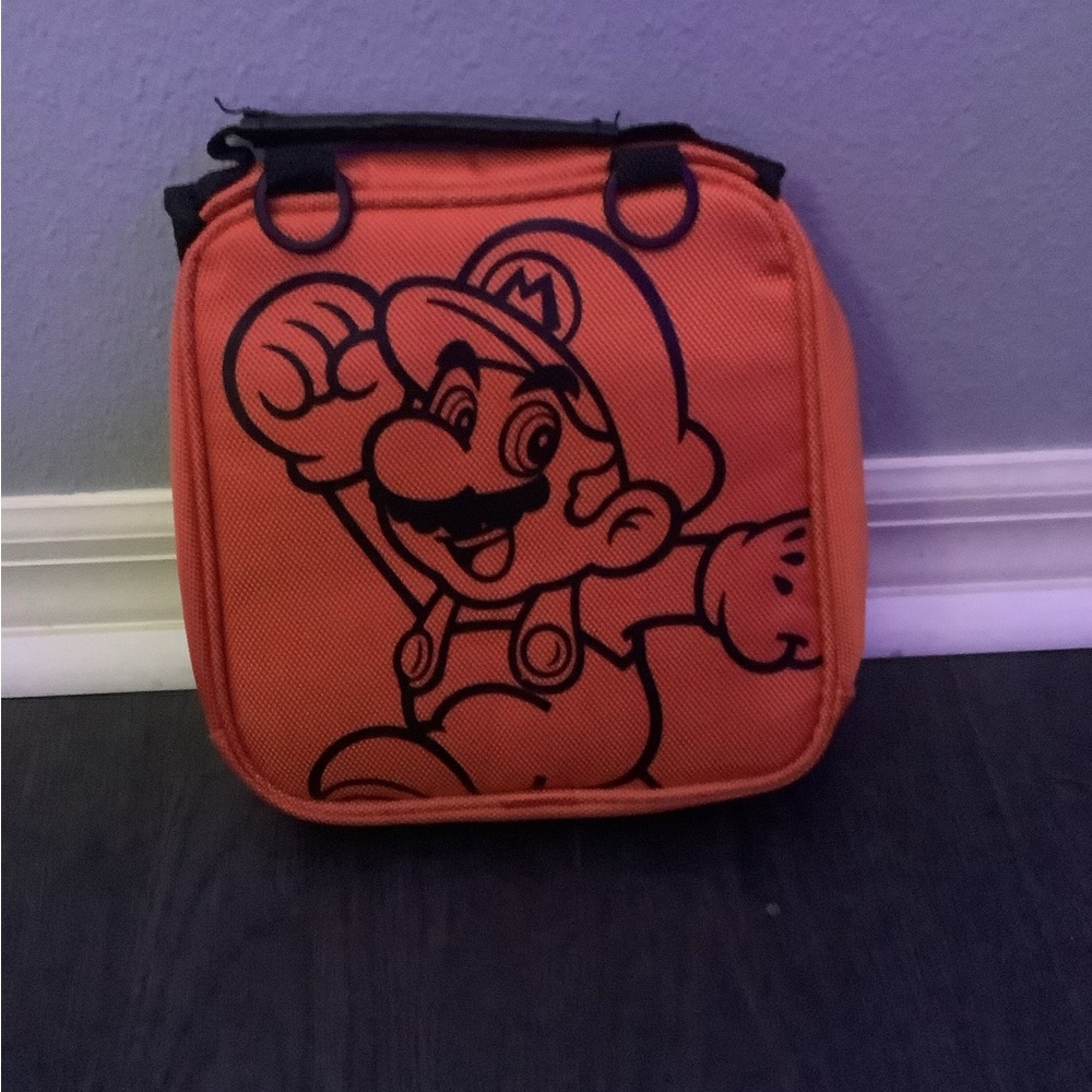 2DS/3DS orange and black hand bag.